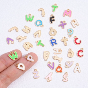 Colorful enamel alphabet pendants in gold alloy for DIY jewelry necklace making