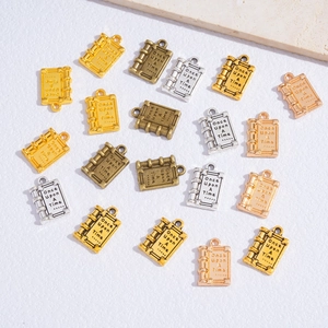 Once Upon A Time storybook alloy charms in gold silver rose gold and bronze finishes
