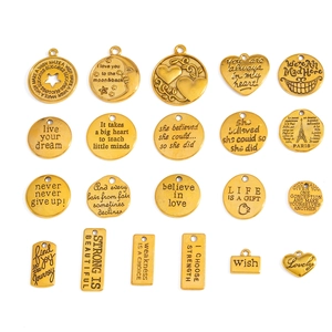 Collection of various gold alloy inspirational word pendants for DIY jewelry making