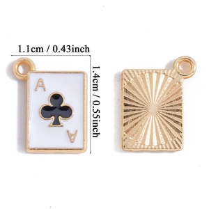 Detail view of Ace of Clubs enamel charm showing white front and sunburst texture back