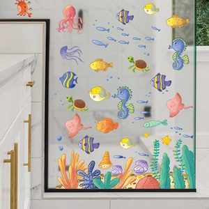 Detail of colorful underwater ocean wall stickers applied on bathroom glass door