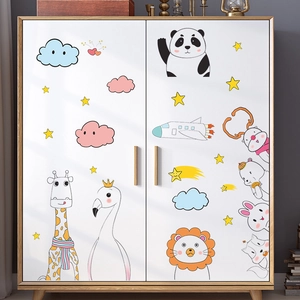 Detailed view of cartoon animal wall stickers on a white closet for kids' room decoration
