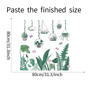 Detail showing tropical green plant wall stickers and pink butterflies decoration
