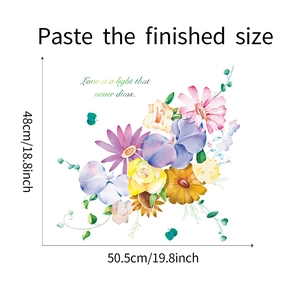 Détail de sticker mural fleurs aquarelle avec citation Love is a light that never dims