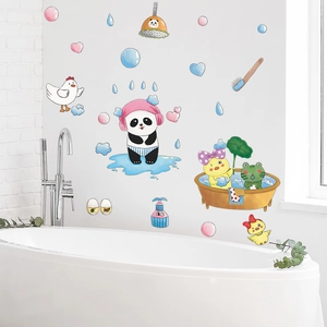 Detail of cartoon animals shower wall stickers featuring panda and frog on bathroom tiles