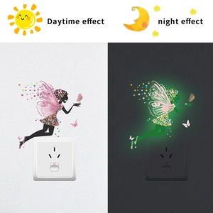 Glow in the dark flower fairy wall sticker showing daytime and night fluorescence effect