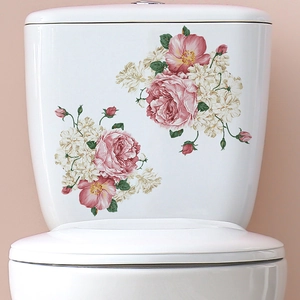 Floral bathroom wall sticker with pink roses and green leaves on white toilet tank