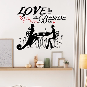 Romantic black silhouette wall sticker with LOVE lettering and couple enjoying coffee scenery