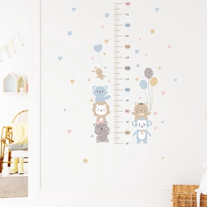 Close-up of cartoon animal height chart with lion and bear for kids room wall decor