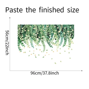 Detail of green leaf wall sticker with dimensions 96x56cm showing finished layout size
