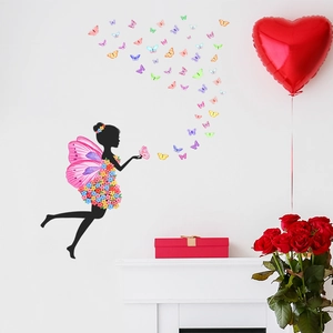 Detail showing cartoon flower fairy silhouette wall decal with colorful 3D butterflies stickers