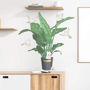 Self-adhesive wall decal featuring large green potted plant with white rabbit and birds
