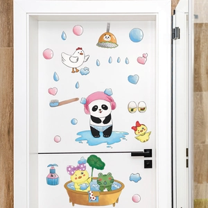 Detailed view of waterproof cartoon panda and frog wall stickers applied to bathroom door