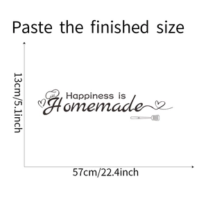 Detail of Happiness is Homemade wall decal with chef hat and spatula icons in black