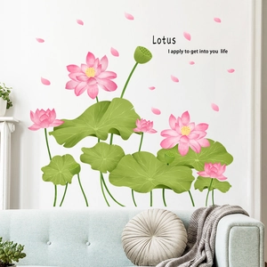 Detail showing elegant lotus and green leaves wall decals on a minimalist white living room wall