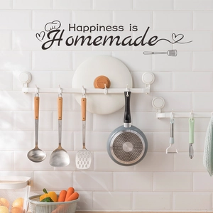 Modern white kitchen rail with movable hooks and Happiness is Homemade wall decal