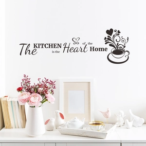 Adesivo murale Kitchen is the Heart of the Home con tazza da caffè su muro bianco