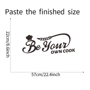 Macro detail of Be Your OWN COOK kitchen wall sticker showing 57cm x 22cm dimensions