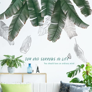 Tropical banana leaf wall stickers for a modern living room with realistic green plant design