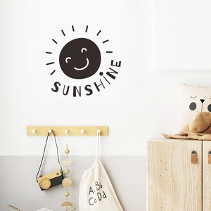 Minimalist black sun wall sticker with Sunshine text and smiley face for home decor