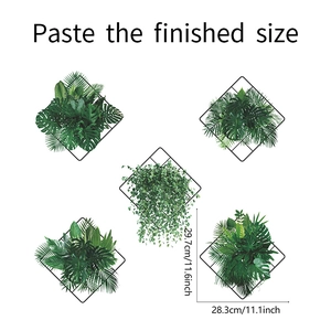 Detail showing tropical monstera leaves and geometric grid wall sticker dimensions