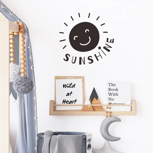 Minimalist sun and sunshine lettering wall decal for cozy nursery decor in black matte vinyl