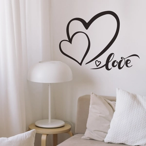 Modern black heart wall decal with cursive love text for romantic bedroom decor