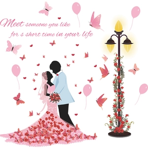 Romantic wedding wall sticker featuring couple silhouette with pink butterflies and street lamp