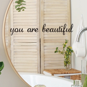 Minimalist 'you are beautiful' mirror decal on round wooden frame for bathroom wall decor