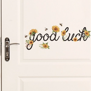 Sunflower wall sticker with Good Luck quote and bees on white door decoration