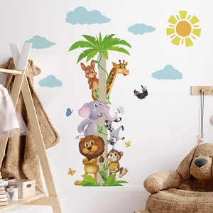 Stickers muraux animaux de la jungle avec girafe et lion dans une chambre d'enfant