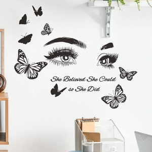 Inspirational wall decal with butterfly silhouette and eyes with quote she believed she could