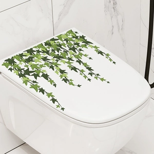 Self-adhesive green ivy leaf wall sticker for toilet lid decoration on white background