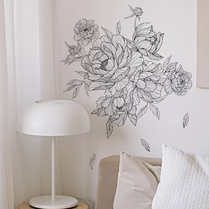 Detailed black line art peony wall stickers applied on a clean minimalist bedroom wall