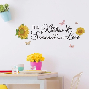 Kitchen wall decal with sunflowers, butterflies, and This Is Kitchen Seasoned With Love slogan