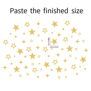 Detail of gold star wall stickers showing 6.4cm solid and hollow five-point stars