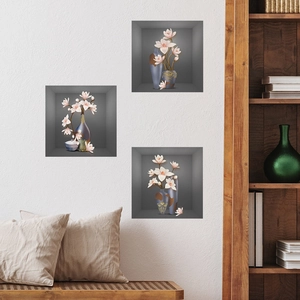 Detail of 3D floral wall stickers with pink magnolias and blue vases in a modern living room