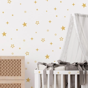 Minimalist gold star wall stickers set with solid and hollow shapes for nursery decor