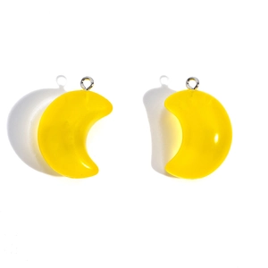 Pair of bright yellow crescent moon resin pendants with silver loops for DIY jewelry