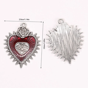 Detailed front and back view of a vintage Gothic Sacred Heart pendant with dimensions