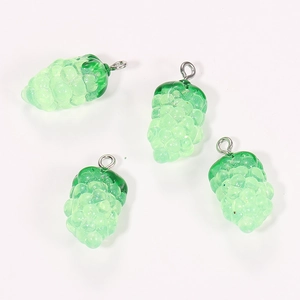 Macro view showing four translucent green resin grape charms with silver metal loops