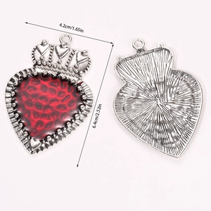 Front and back detail of gothic crown heart pendant with red leopard pattern