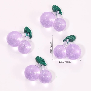 Detailed view of 2.1cm purple resin cherry charms with glitter for DIY jewelry making