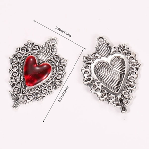 Detailed size view of Gothic heart pendant with red resin and silver metal engraving