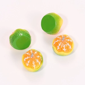 Detailed view of 3D resin citrus orange charms with silver loops for DIY jewelry