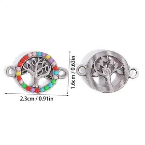 Detail view of double-sided colorful resin tree of life turtle pendant connectors