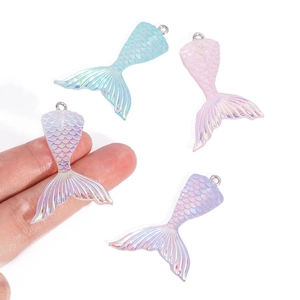 Colorful resin mermaid tail pendants with shimmering scale textures for DIY jewelry crafts