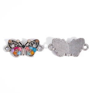 Detail of butterfly connector charm with colorful beads and crystal rhinestones