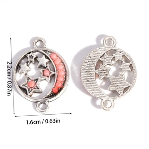 Detailed view of sun and moon alloy pendant connector with pink beads and size specs