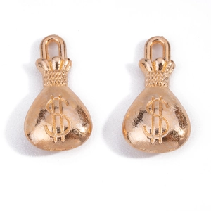 Detail of two gold dollar sign money bag charms for DIY jewelry making accessories